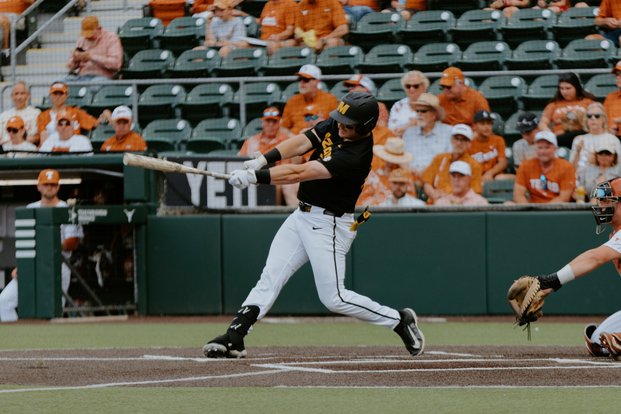 Jase Woita drives a ball against No. 6 Texas at Disch-Falk Field on May 15, 2026